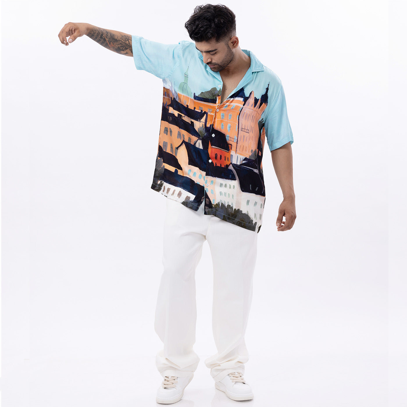 Stylera unique graphic button up shirt in light blue with vibrant cityscape design for stylish casual wear