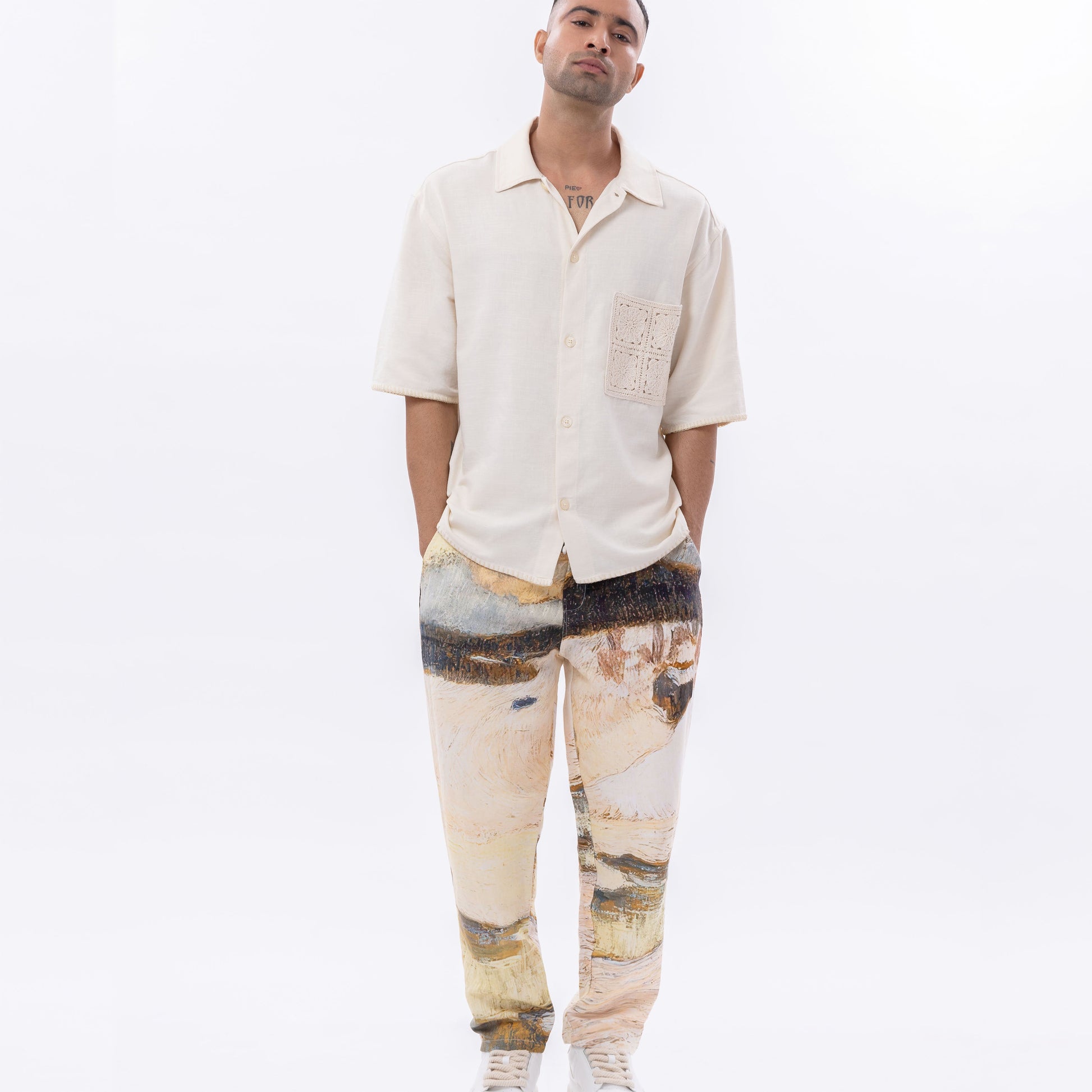 Men's Stylera unique graphic joggers paired with a casual short-sleeve shirt for a stylish look