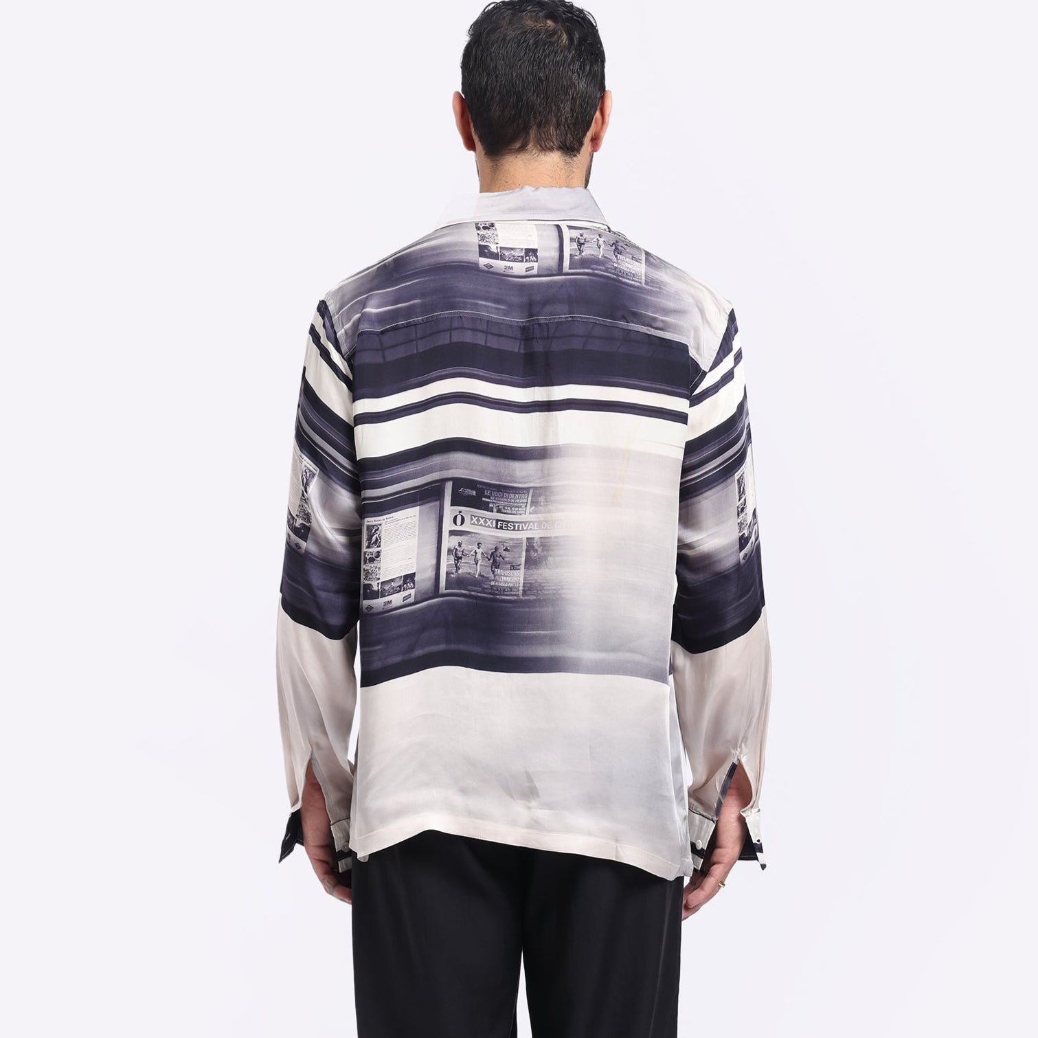 Stylera unique graphic long sleeve shirt featuring a stylish newspaper print design on the back