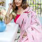 Unique handpainted saree for weddings featuring delicate floral designs and soft pink fabric
