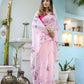 Stylera unique handpainted saree for weddings in soft pink with floral designs and elegant draping