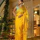 Unique Indian saree with embroidery in vibrant yellow, styled elegantly for festive occasions