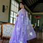 Stylera unique organza saree with artwork in lavender featuring floral designs and elegant draping
