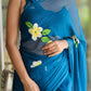 Elegant blue unique party wear saree with vibrant floral designs for special occasions