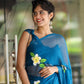 Elegant blue unique party wear saree with floral embroidery, perfect for festive occasions