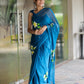 Stylera unique party wear saree in blue with floral embroidery for elegant occasions