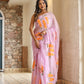Unique party wear saree hand painted in pink with vibrant floral designs for elegant occasions