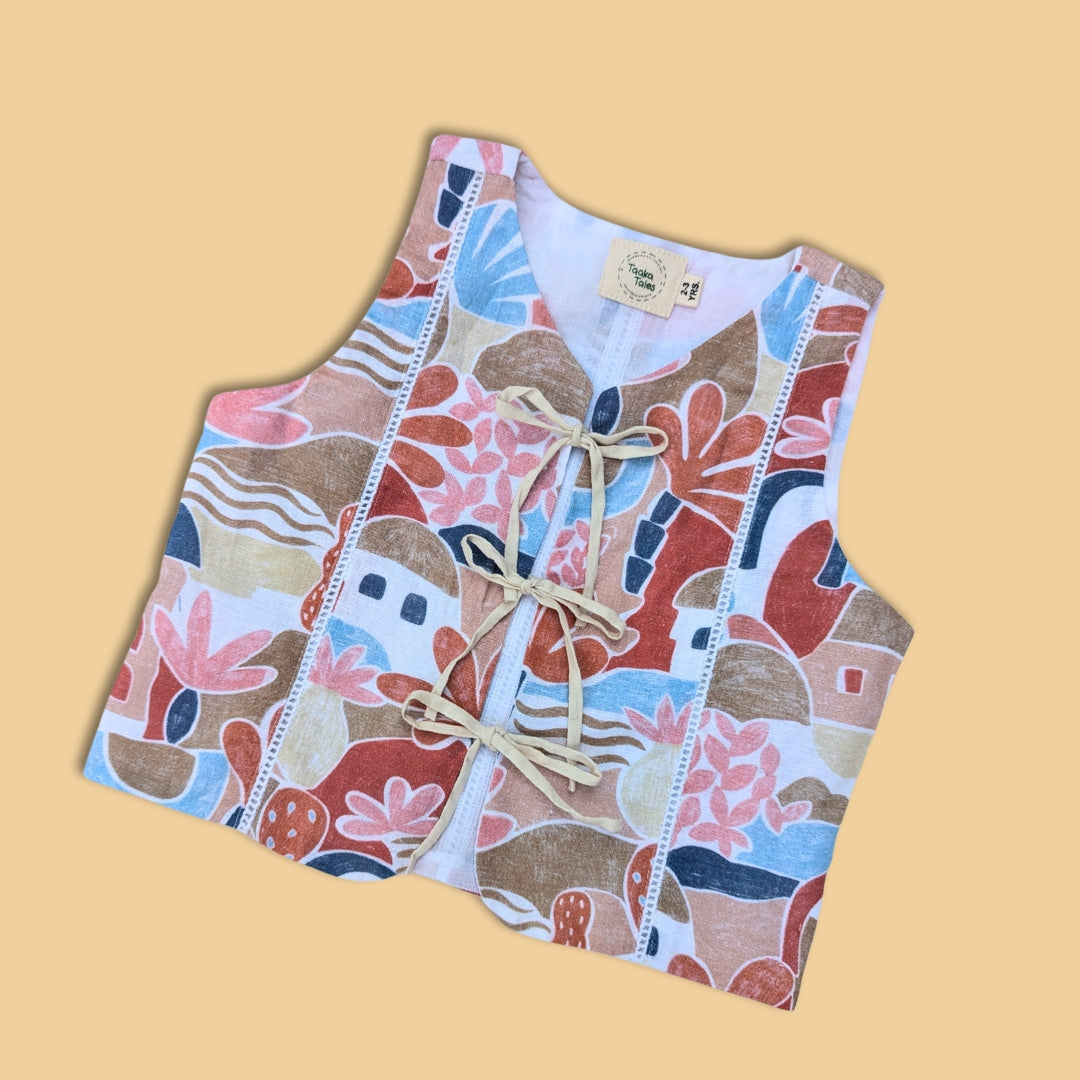 Unique patterned sleeveless vest with colorful designs and adjustable lace for a stylish look