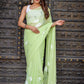 Elegant light green Stylera unique saree for wedding guest with floral design and soft fabric