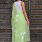 Elegant light green unique saree for wedding guest with floral embroidery for a chic look
