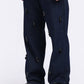 Stylera unique statement jeans for men featuring stylish zipper details on dark denim