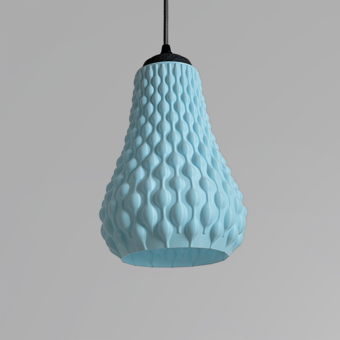 Unique textured hanging lamp in light blue with a stylish design for modern home decor