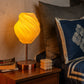 Unique wave pattern desk lamp with a warm glow, perfect for adding style to any bedroom or workspace