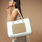 Woman carrying a vanilla taupe box tote bag with elegant design and spacious interior