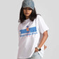 Stylera good vibes only graphic tee for women in white with blue design worn with denim cap and ripped jeans