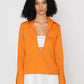 Stylera orange v-neck blouse for women with long sleeves and tailored cuffs