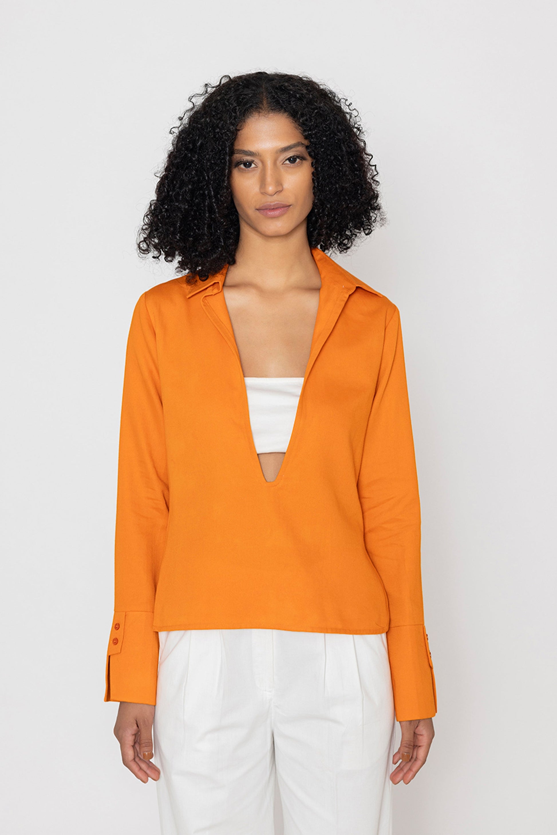 Stylera orange v-neck blouse for women with long sleeves and tailored cuffs