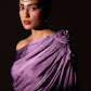 Stylera purple draped evening top with floral detail on shoulder styled on model