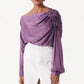 Stylera purple draped evening top with off-shoulder design and floral detail paired with white skirt