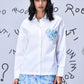 Stylera white sequin heart shirt with blue floral sequin skirt on model