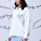 Stylera white sequin heart shirt with blue floral sequin heart detail on chest