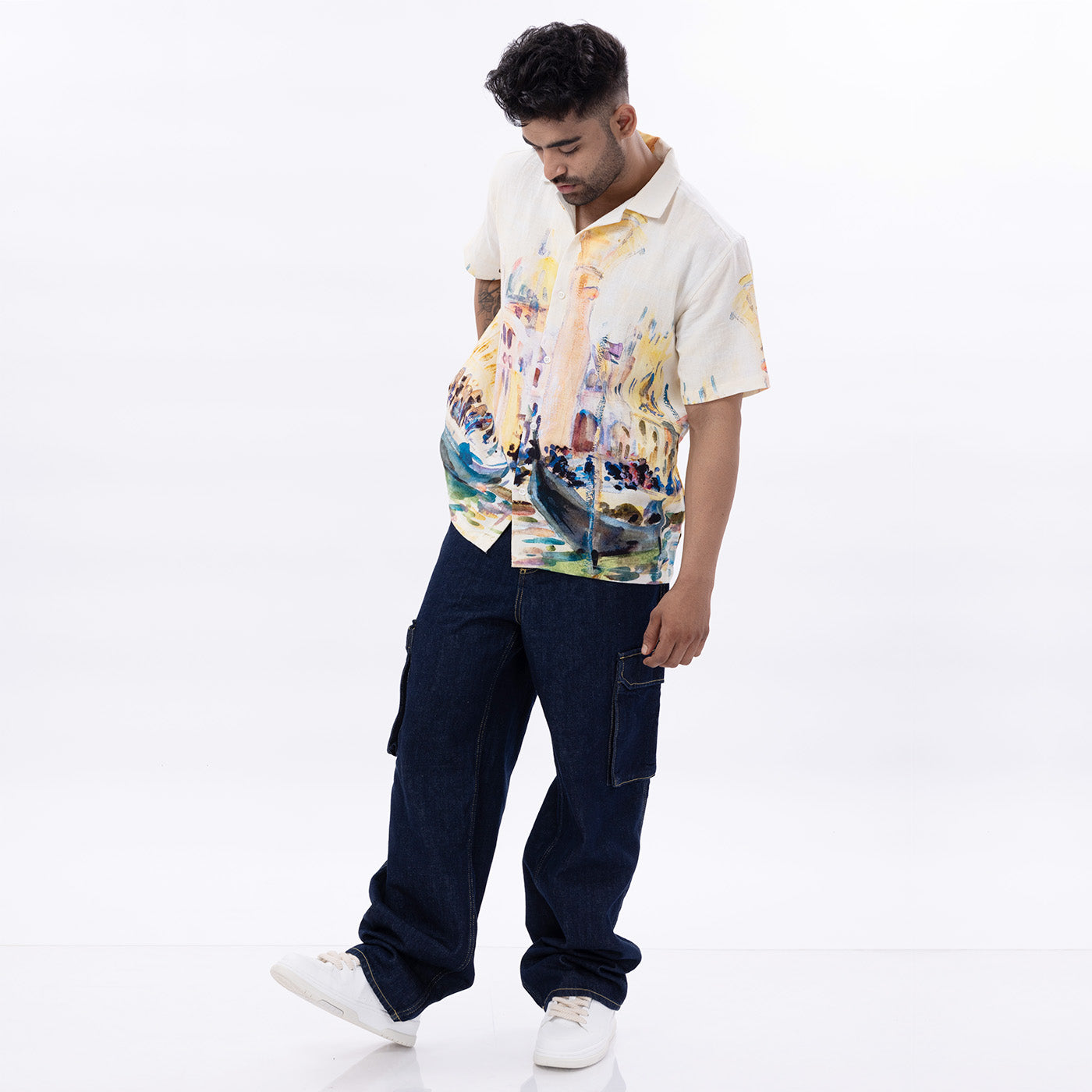 Men wearing a Venice printed shirt for men with colorful artistic design paired with casual pants