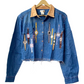 Stylera trendy cropped denim jacket with tan collar frayed hem and embroidered watch motifs