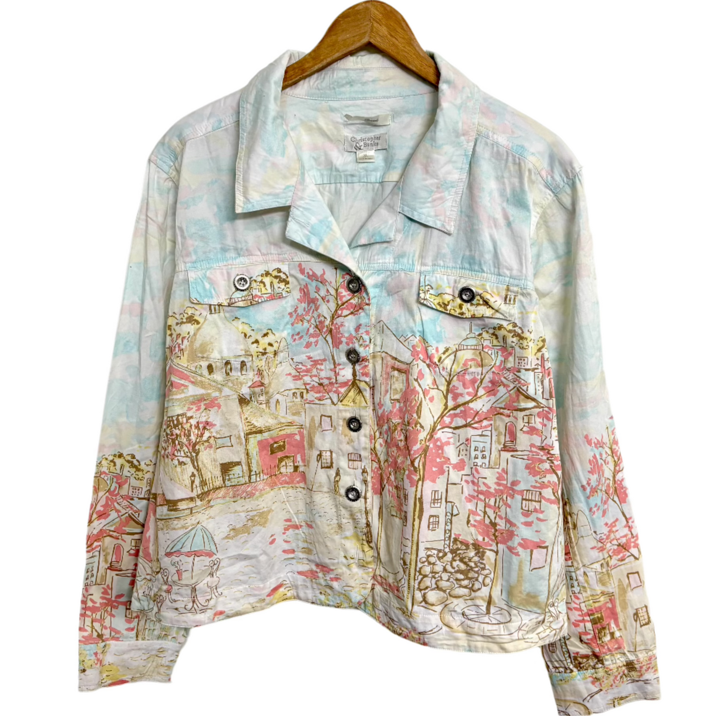 Stylera women's printed denim jacket with pastel watercolor cityscape print cropped boxy fit on hanger