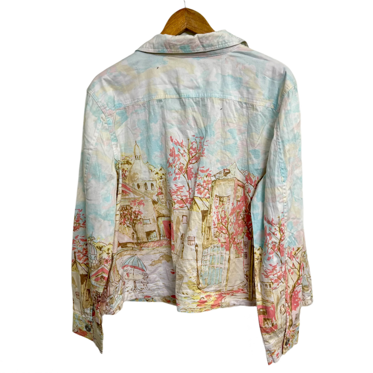 Back view of Stylera women's printed denim jacket with pastel watercolor cityscape print