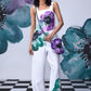 Stylera white coral floral jumpsuit sleeveless dungaree with purple and teal oversized flowers wide leg