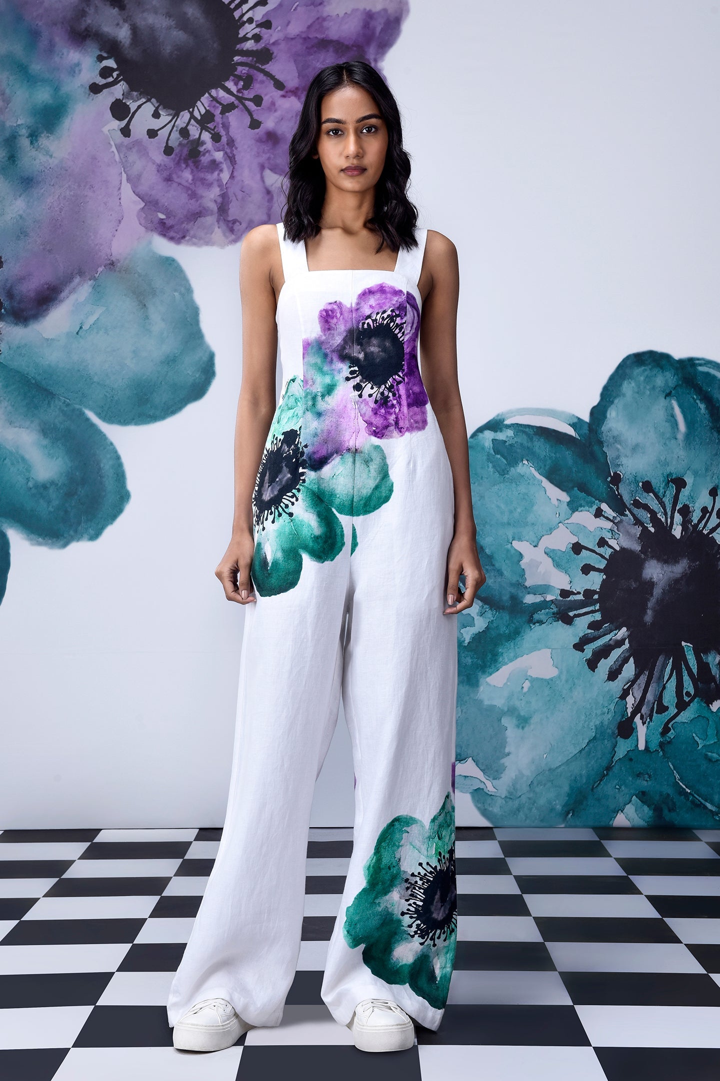 Stylera white coral floral jumpsuit with wide leg cut square neckline and bold purple and green floral print