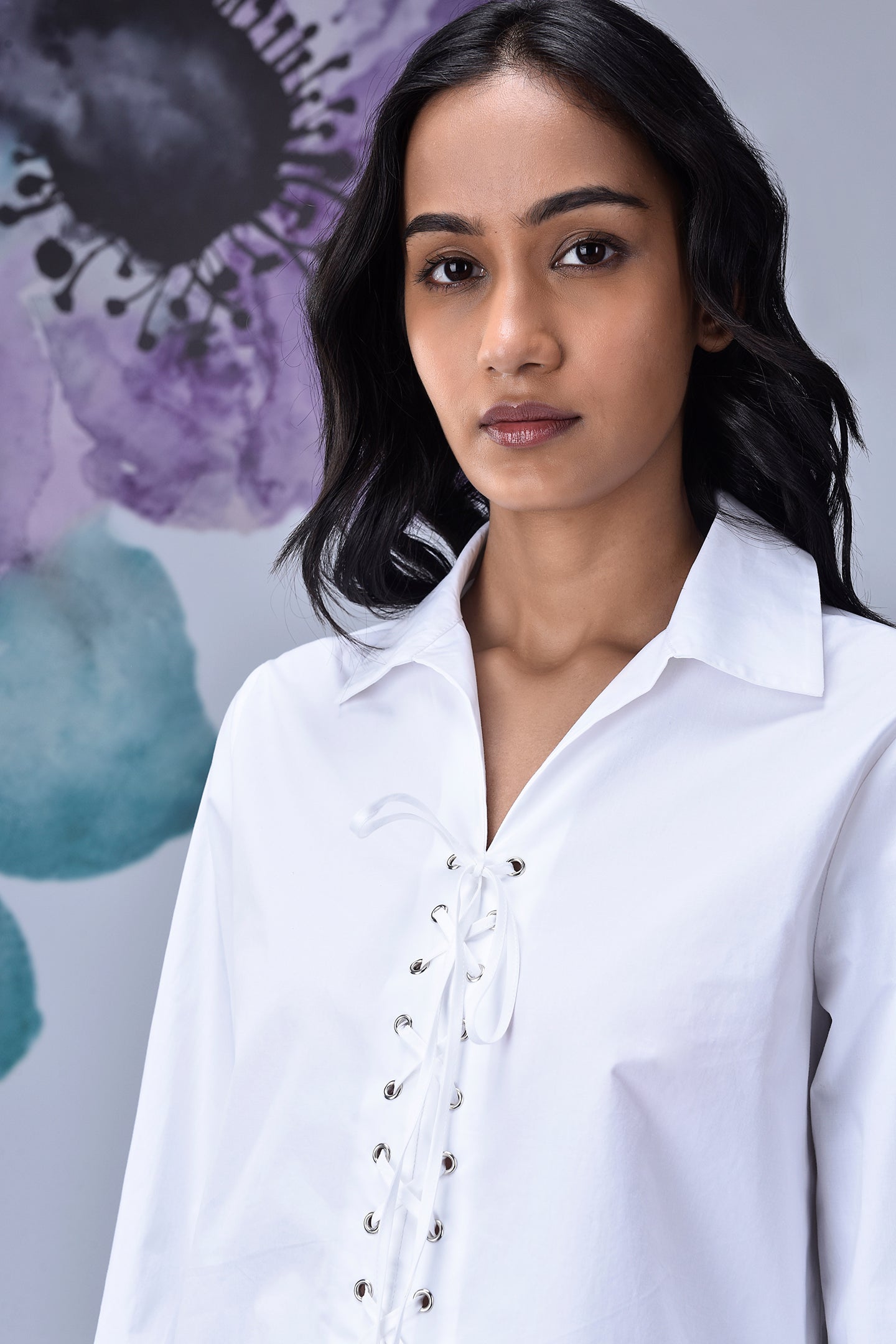 Stylera white cotton lace up shirt with eyelet front and classic collar on model