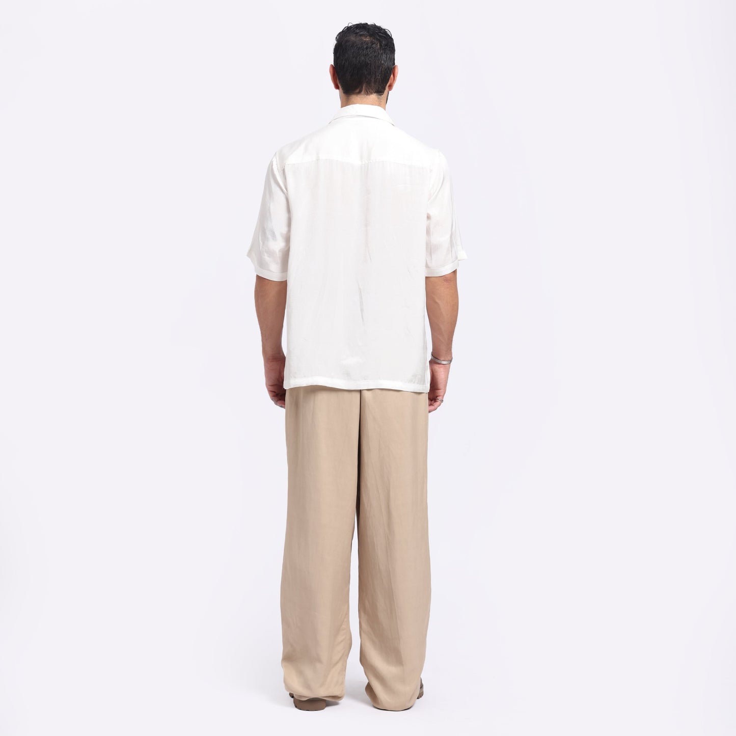 Back view of white embroidered casual shirt from Stylera, featuring a relaxed fit and short sleeves