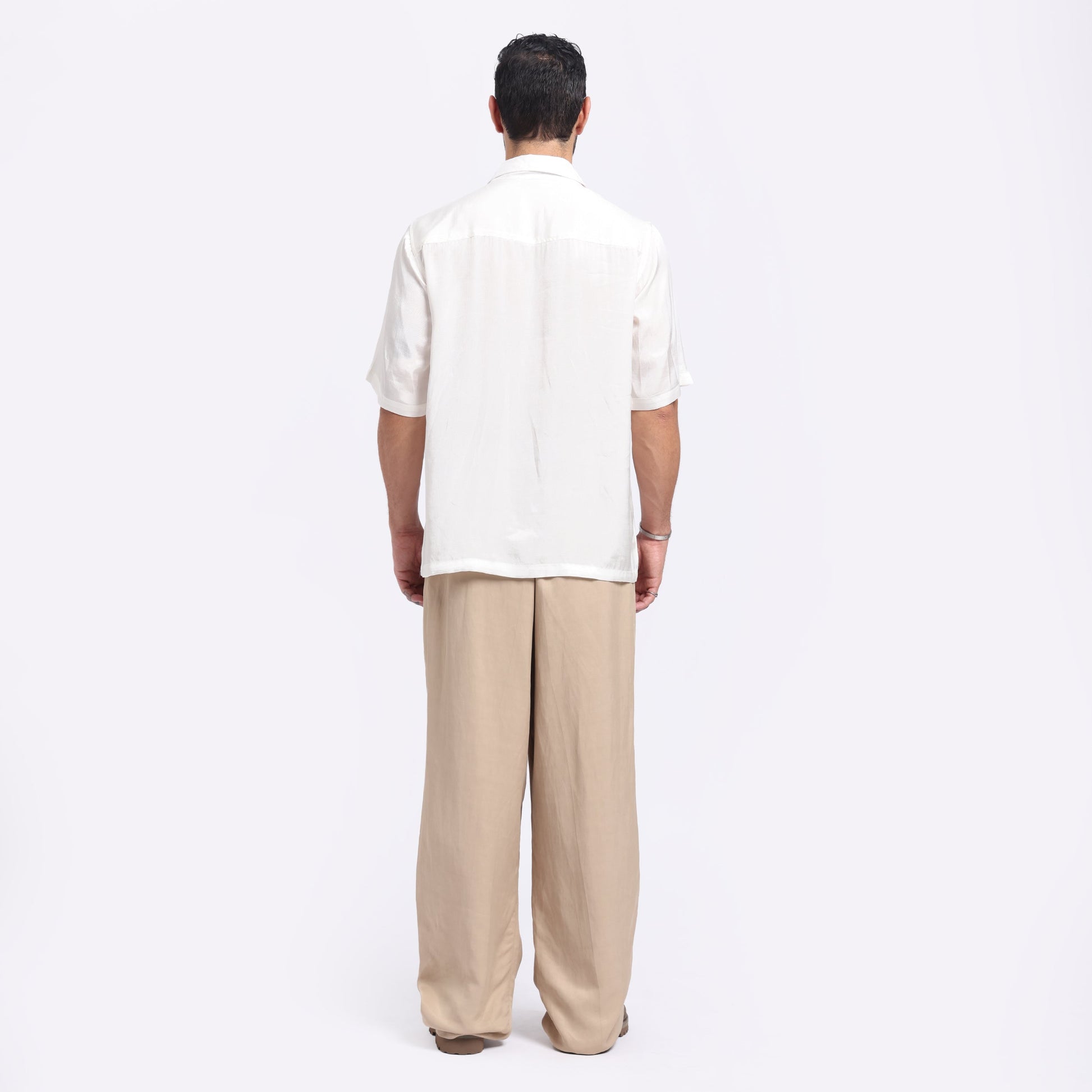 Back view of white embroidered casual shirt from Stylera, featuring a relaxed fit and short sleeves