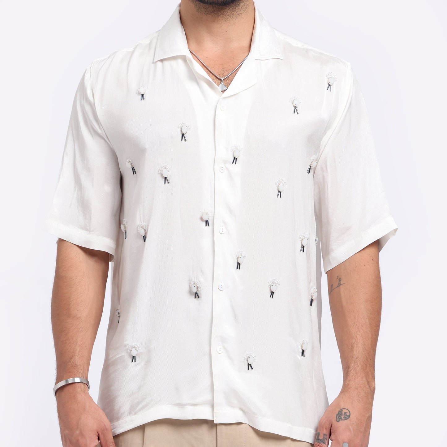 Stylera white embroidered casual shirt featuring a lightweight design and unique embroidery details