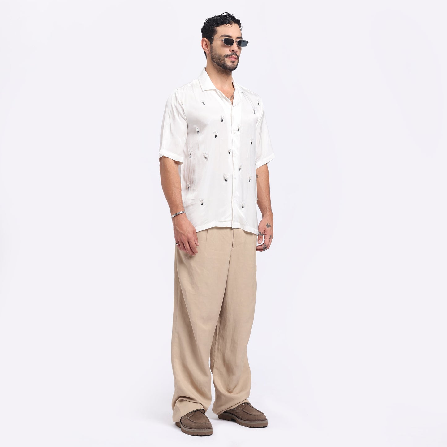 Stylera white embroidered casual shirt displayed on a model for a stylish summer look