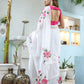Elegant white floral saree for women with pink floral designs, styled for a chic look
