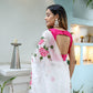 Elegant white floral saree for women featuring pink floral designs and a stylish back neck design
