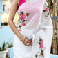 Elegant white floral saree for women with pink rose patterns, perfect for festive occasions