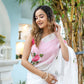 Elegant white floral saree for women featuring pink roses, ideal for festive occasions
