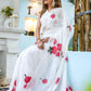 Elegant white organza saree for women featuring vibrant floral designs, perfect for special occasions.
