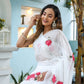 Elegant white organza saree for women featuring floral designs, perfect for festive occasions