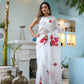 Elegant white organza saree for women with floral patterns, perfect for festive occasions