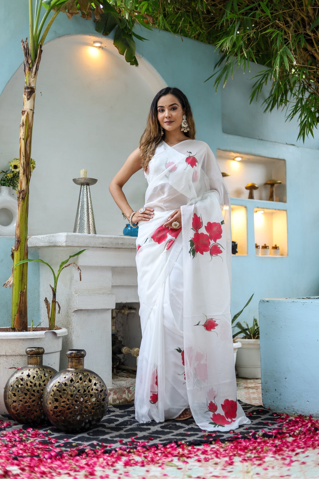 Elegant white organza saree for women with floral patterns, perfect for festive occasions