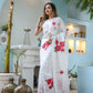 Elegant white organza saree for women with red floral prints, perfect for festive occasions.