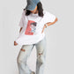 Stylera white oversized anime t-shirt for women featuring a cute anime character print