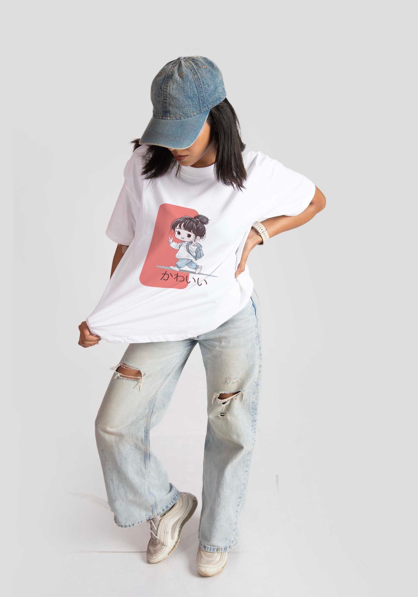 Stylera white oversized anime t-shirt for women featuring a cute anime character print