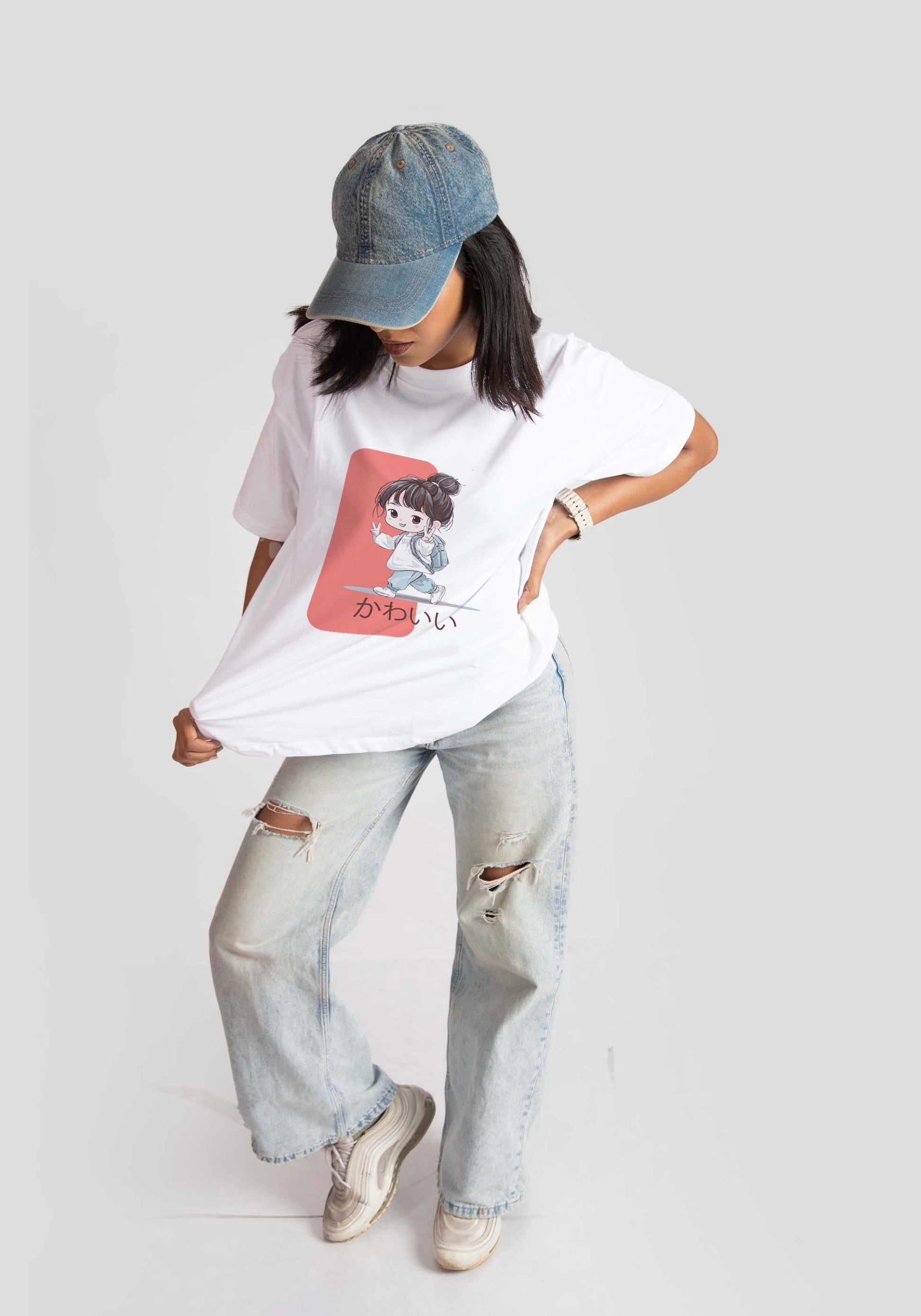 Stylera white oversized anime t-shirt for women featuring a cute anime character print