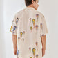 White oversized beach shirt men featuring colorful jellyfish print on a light background.