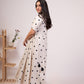 Elegant white polka dot dress for women with short sleeves and a flowy silhouette
